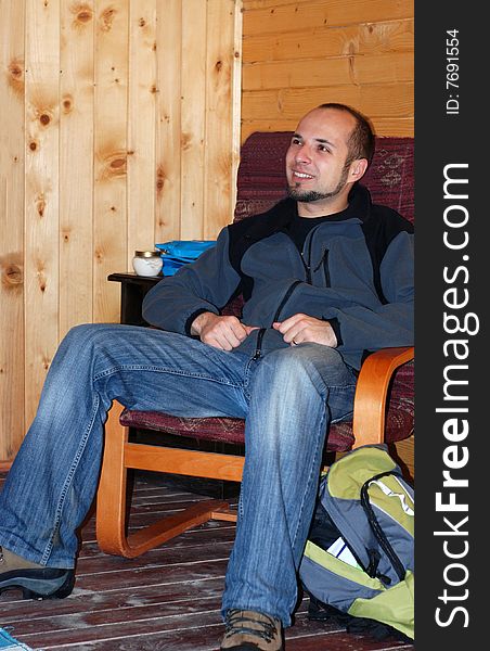 Man resting in the chalet