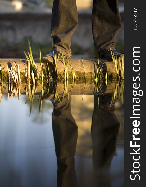 Picture of a man reflecting in a pond. Picture of a man reflecting in a pond