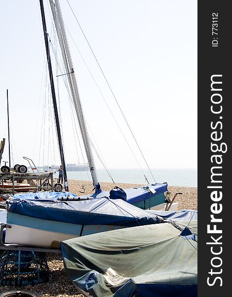 Boats along Brighton beach