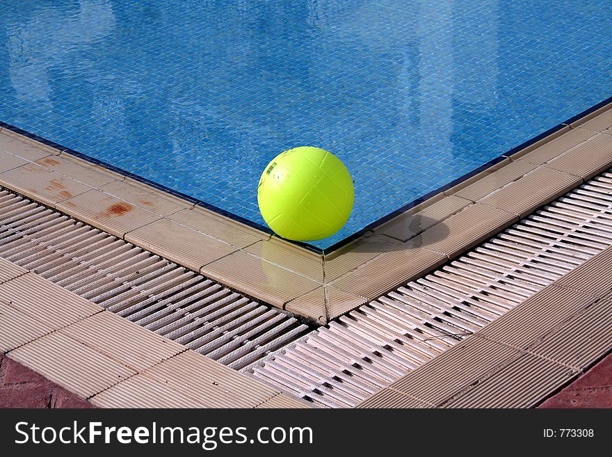 Beach Ball at the corner of a Pool