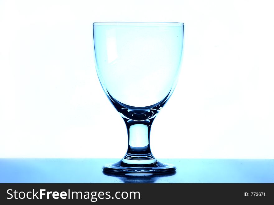 A wine glass or goblet. A wine glass or goblet