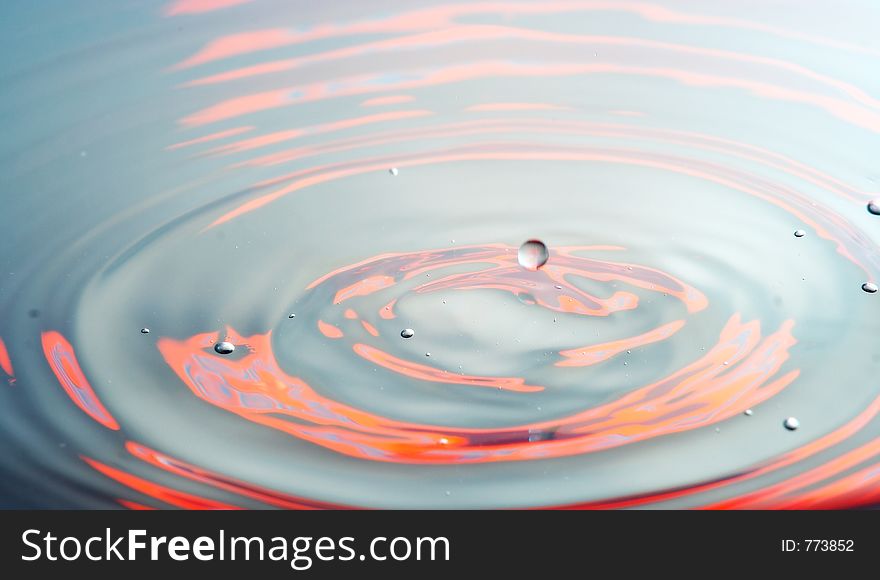 Water drop and ripples splash. Water drop and ripples splash