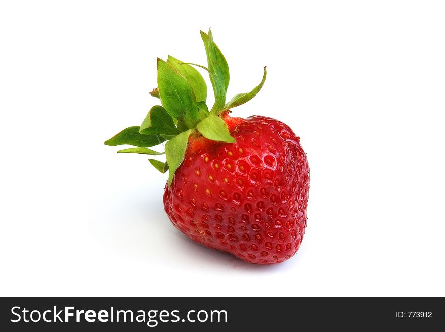 Isolated fresh red and green strawberry