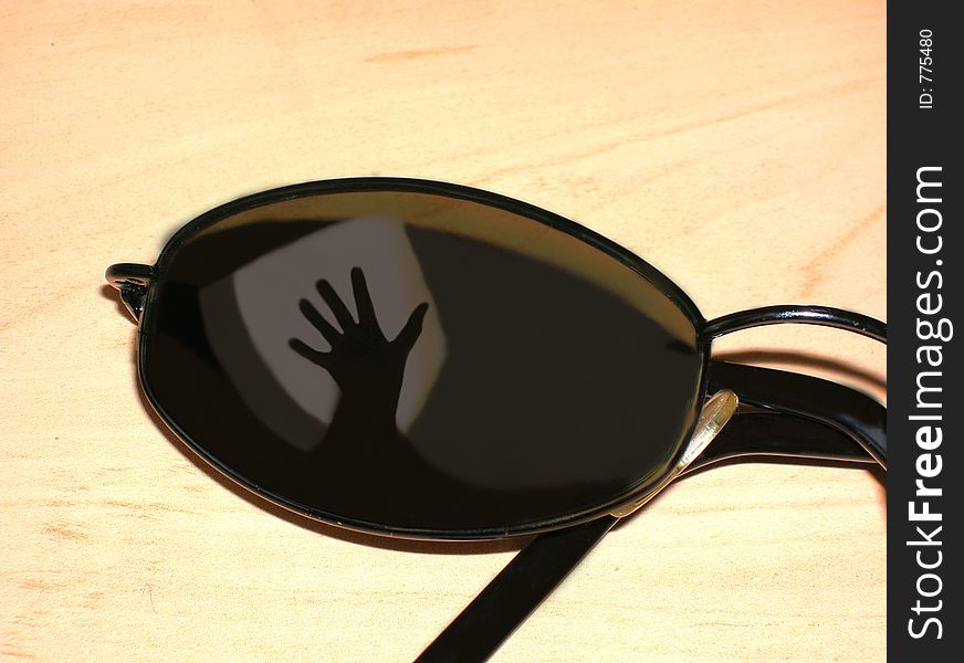 Greetings reflection on sunglasses. Greetings reflection on sunglasses