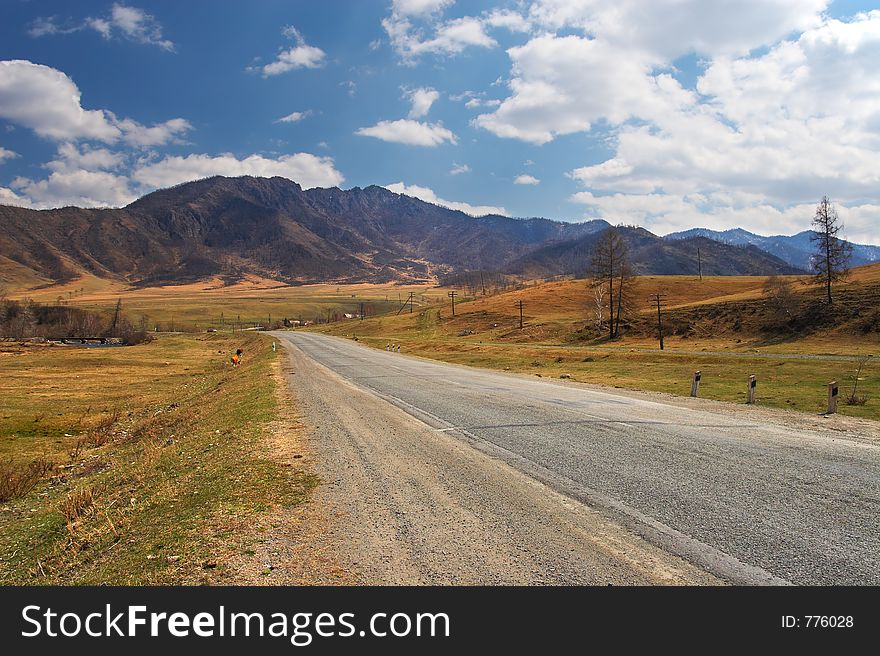Road, mountains and skies. Altay