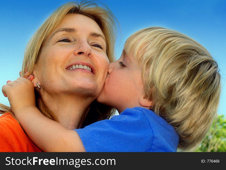 Young boy and his mother share a joyful moment. Young boy and his mother share a joyful moment.