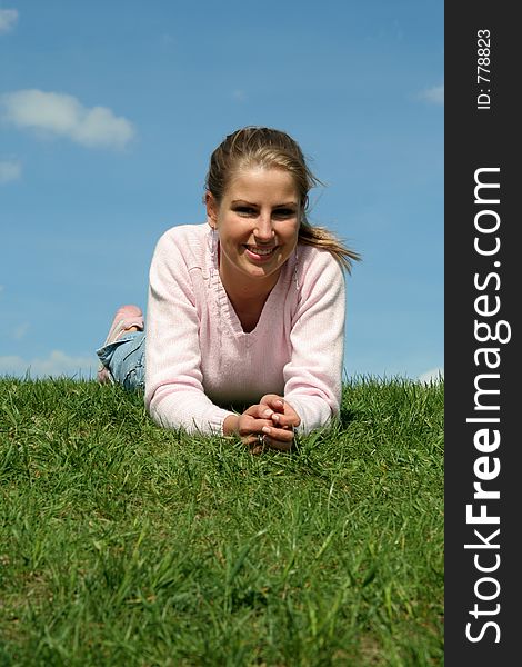 Woman Lying On Grass