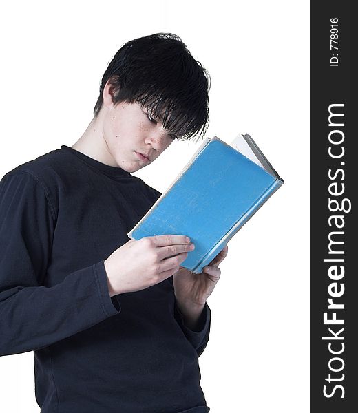Isolated teen reading a book