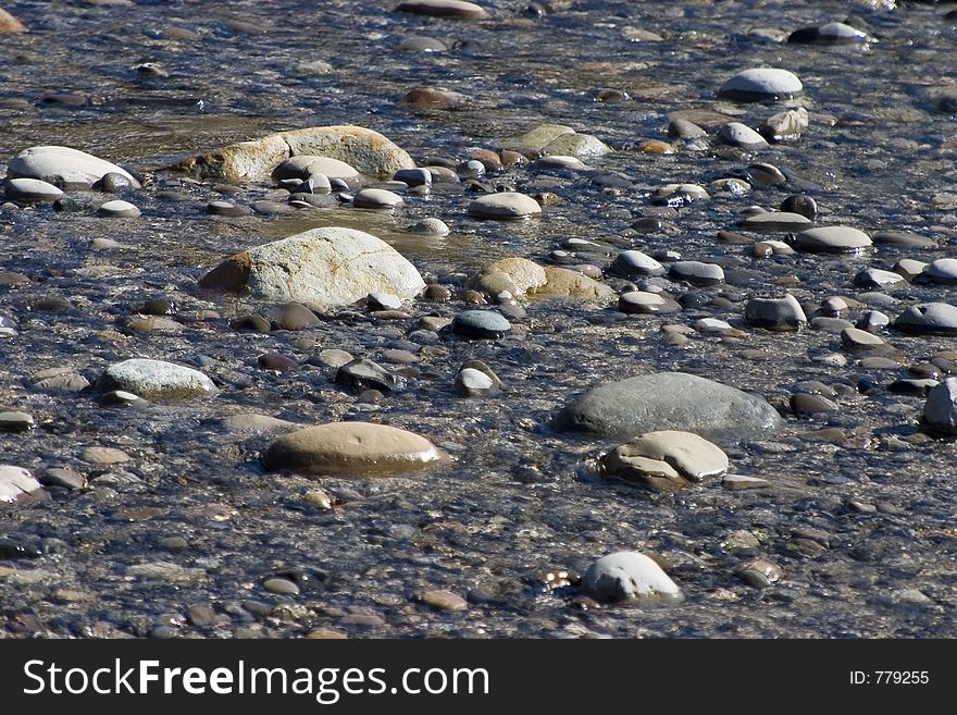 The polished stones of a stream. The polished stones of a stream.