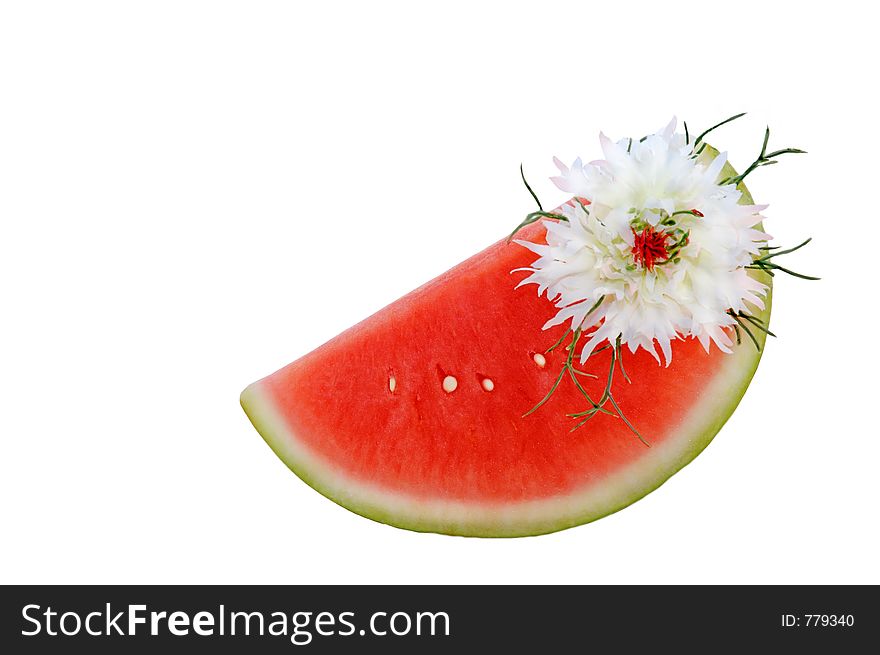 Slice of a watermelon with flower on a white isolated background