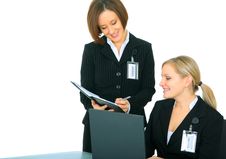 Businessteam Talking Over Daily Agenda Royalty Free Stock Image