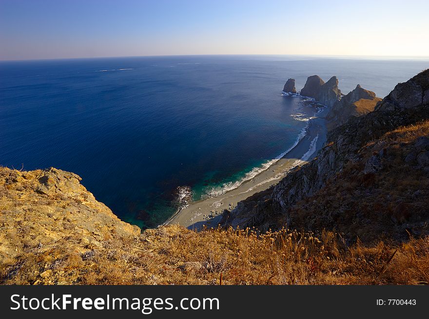 Sunset on cape of Four Rocks. The Far East. Russia.