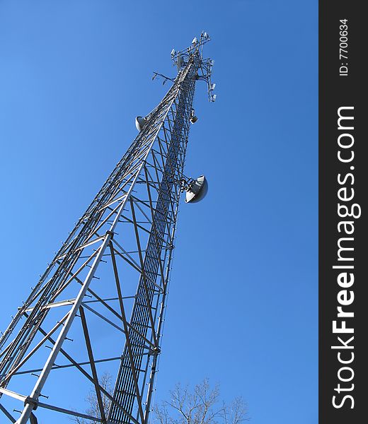 Multi antenna communications tower with low angle view