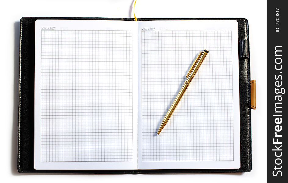 Notebook with the handle lays on a white