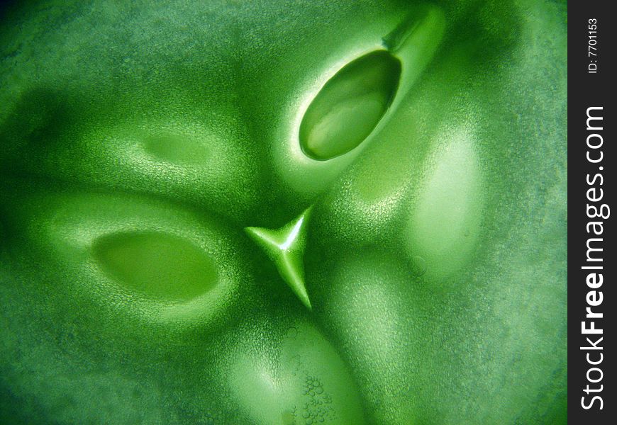 Green cucumber in cut.Abstract image.