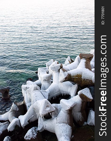 Rocks covered with ice at the Black Sea. Rocks covered with ice at the Black Sea