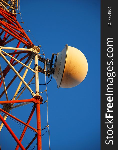 Antenna locked on a telecommunication tower. Antenna locked on a telecommunication tower