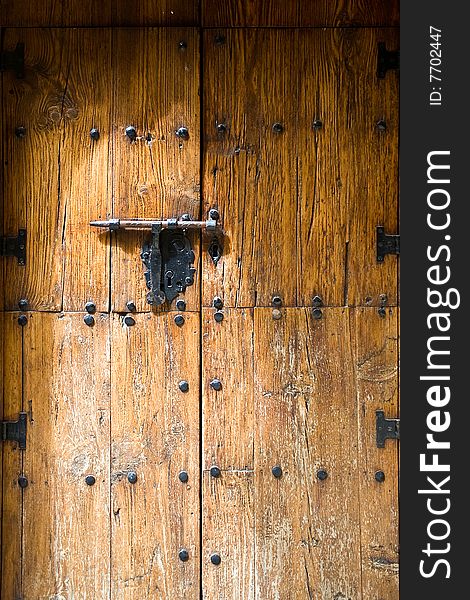 An old iron metal door handle knocker and locker. An old iron metal door handle knocker and locker