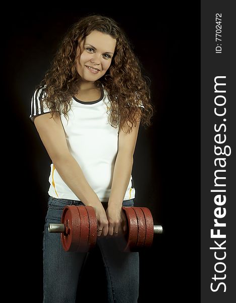 Beautiful Girl With Red Dumbbells