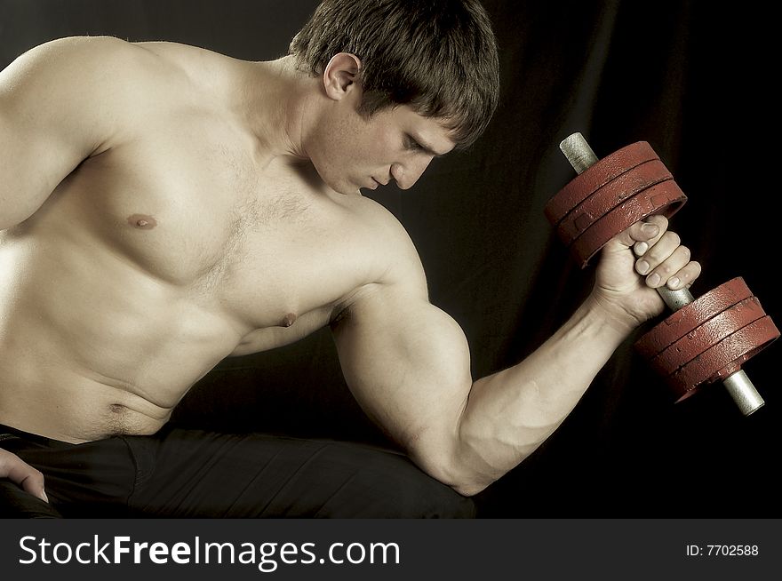 Athlete with dumbbells