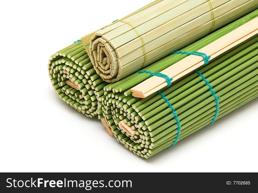 Curtailed bamboo mats isolated on white background.