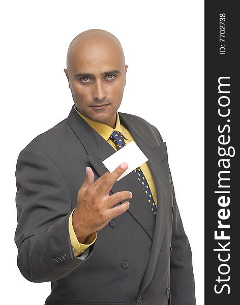 Businessman with a business-card isolated against a white background. Businessman with a business-card isolated against a white background