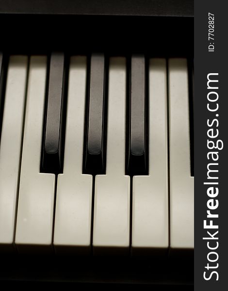 Close up of piano keys in black and white