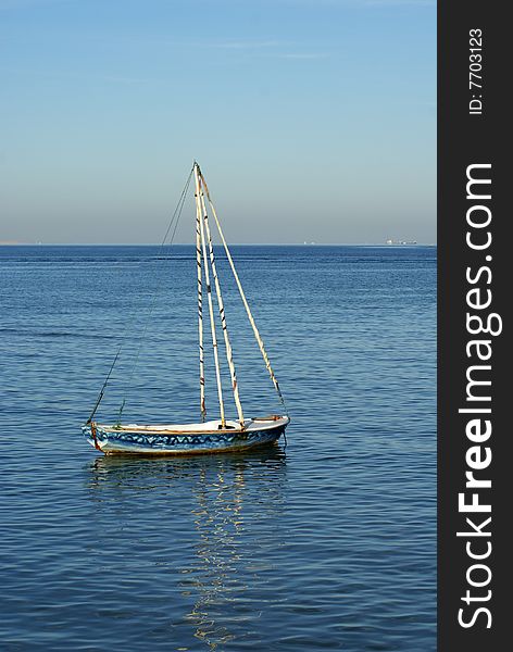 Old boat in the sea water