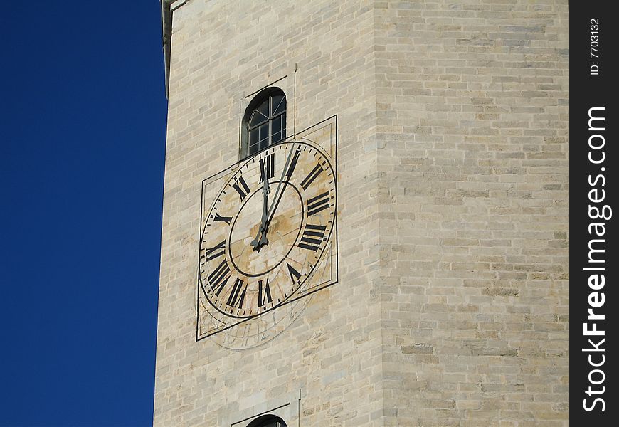 Girona  cathedral clock tower by mid-day