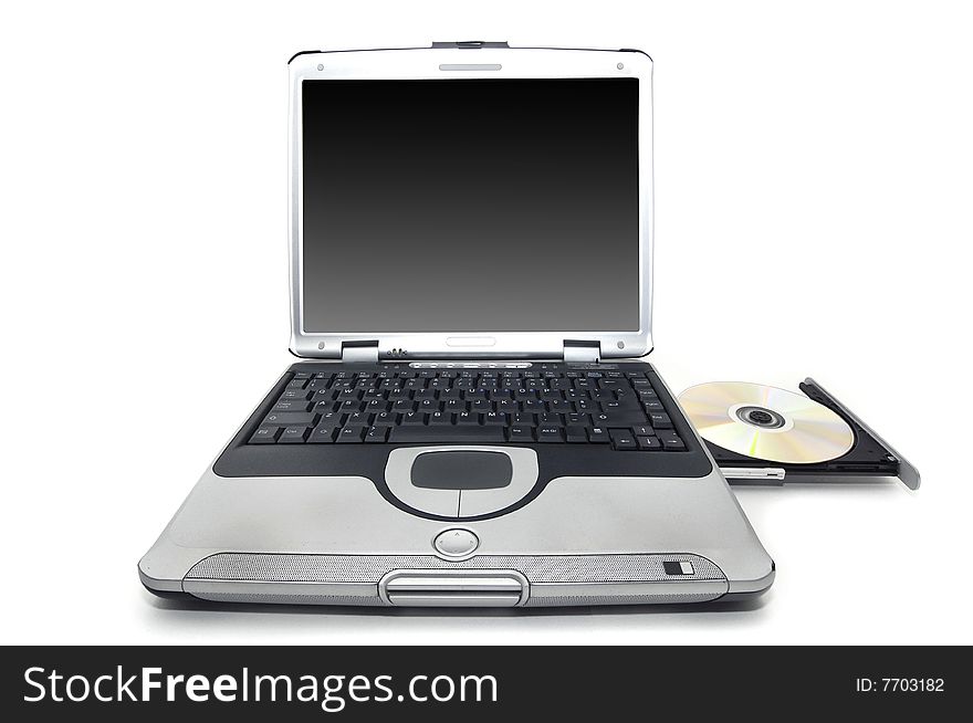 Laptop with CD door open isolated in white. Laptop with CD door open isolated in white