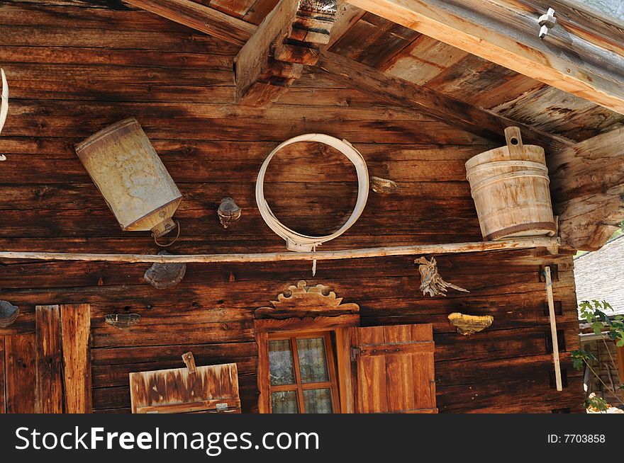 A detail view of a house in an alpine valley. A detail view of a house in an alpine valley.