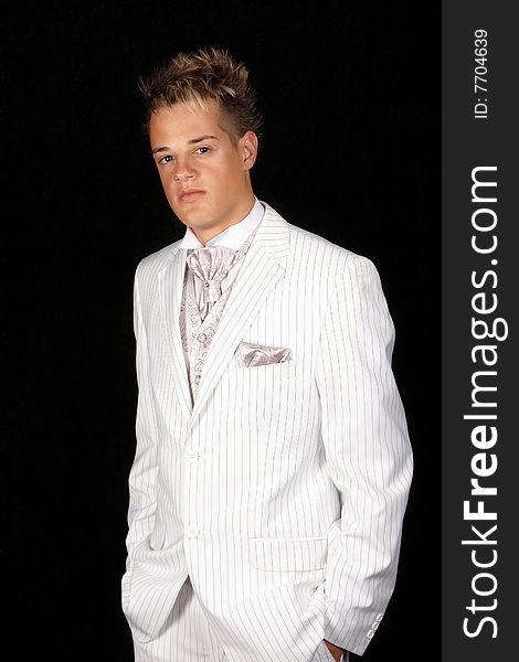 Young male model with white pin striped suit and tie. Young male model with white pin striped suit and tie