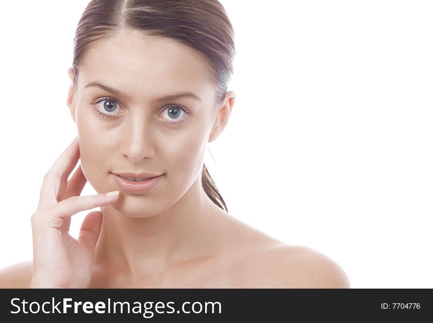 High key portrait of beautiful  young woman on white back