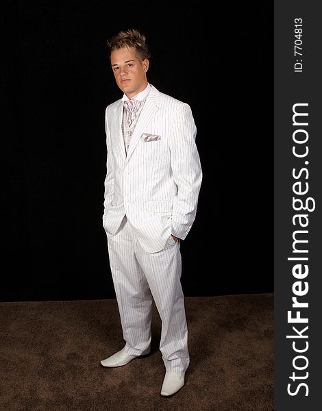 Young male model with white pin striped suit full length. Young male model with white pin striped suit full length