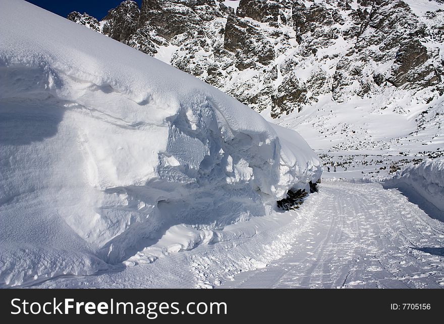 The winter road in mountains