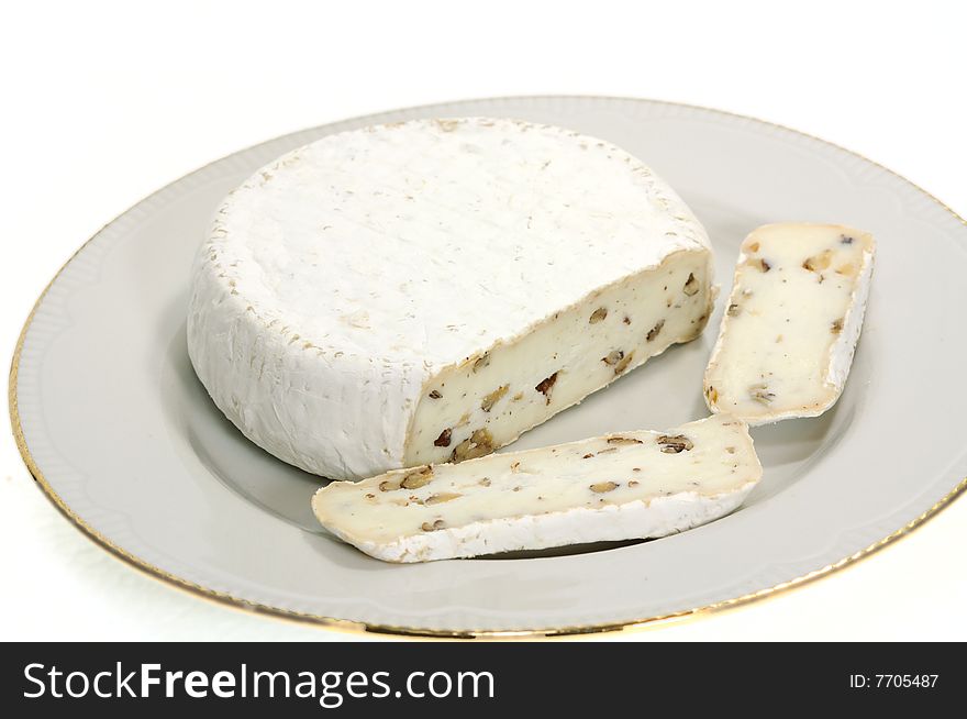 Camembert is made cow's milk, and is ripened by the moulds Penicillium candida and Penicillium camemberti with additive nut