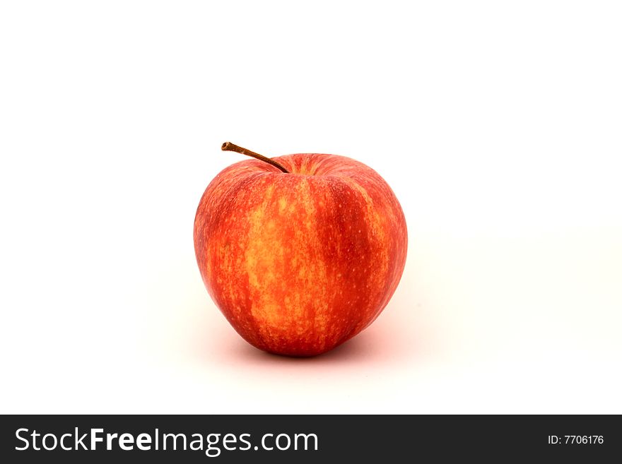 A red apple on a white background. A red apple on a white background