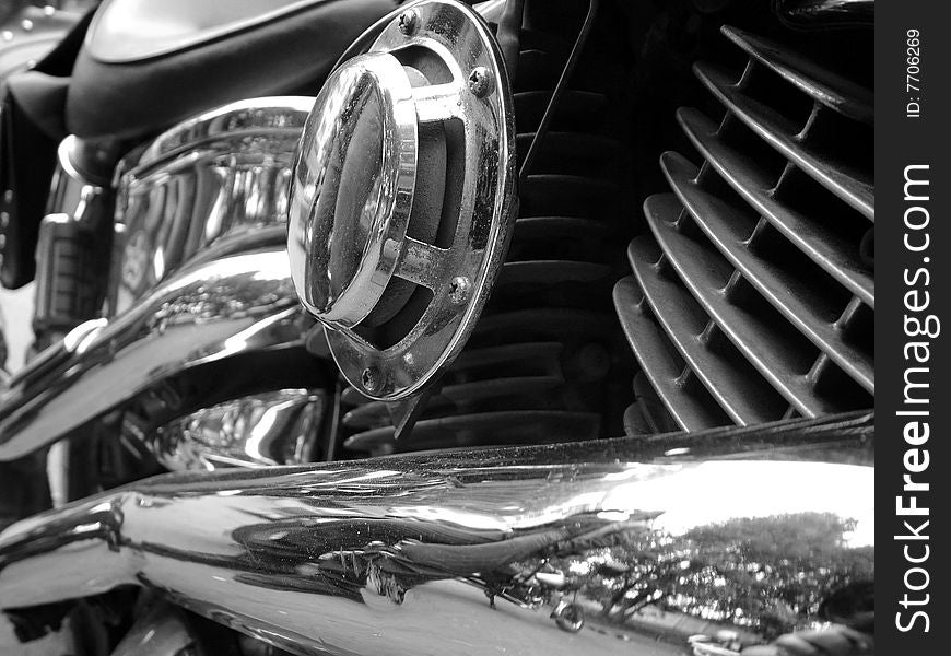 Bike engine shown closely with a lot of reflections on all chrome surfaces. Bike engine shown closely with a lot of reflections on all chrome surfaces