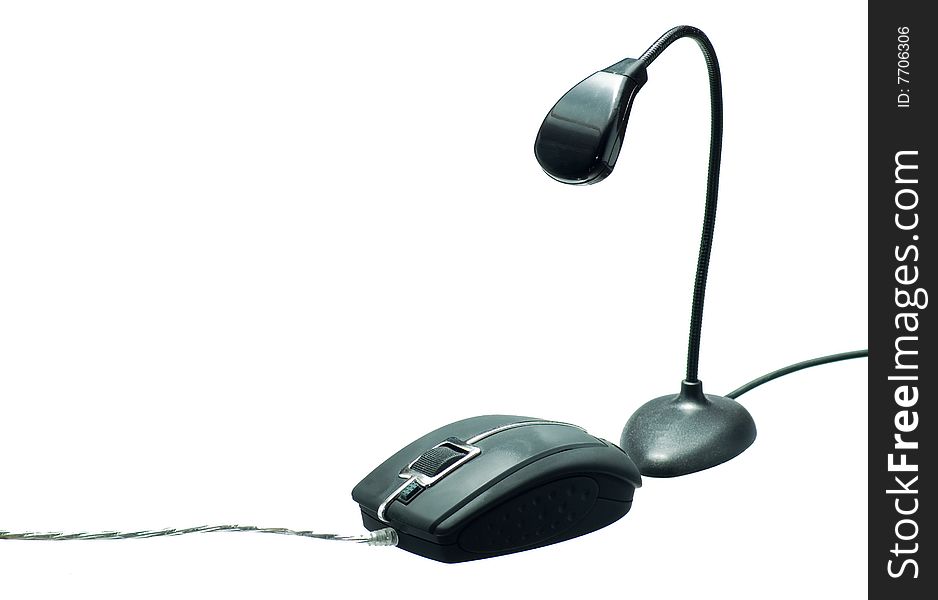 Computer mouse and desk lamp on a white background. Computer mouse and desk lamp on a white background