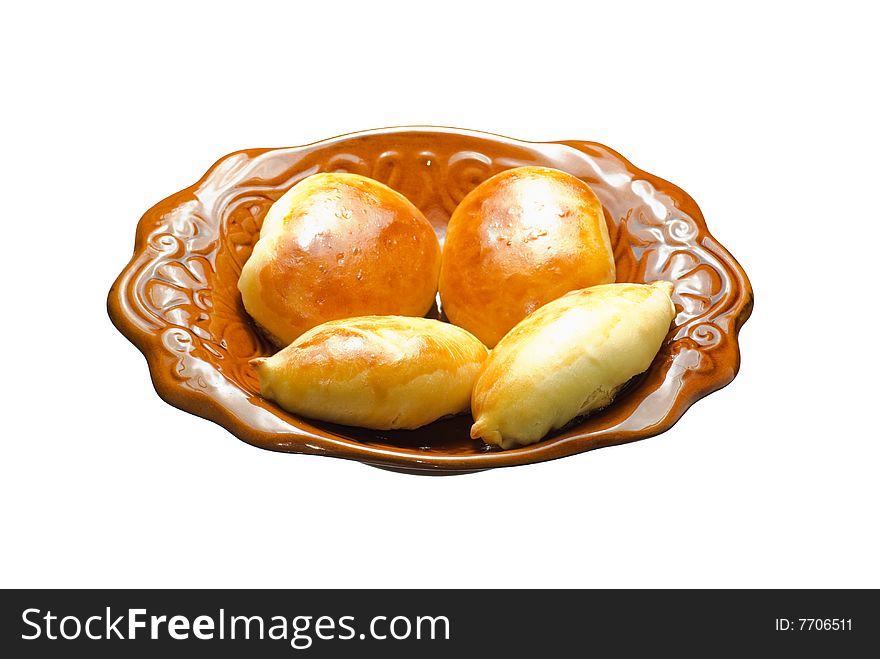 Fresh cooked sweet cakes on a white background