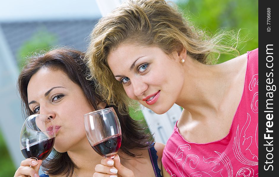 Portrait of two young attractive girls having good time. Portrait of two young attractive girls having good time