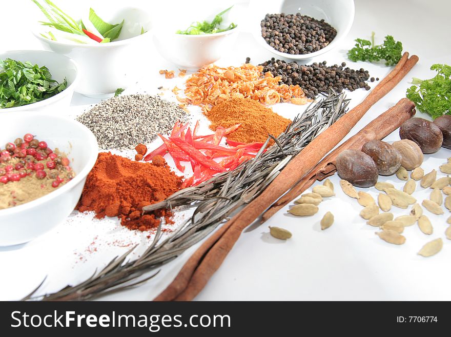 Herbs and spices on white background