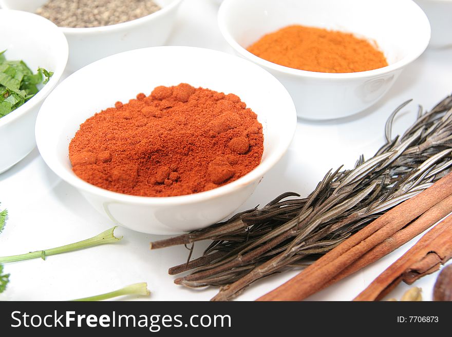 Herbs and spices on white background