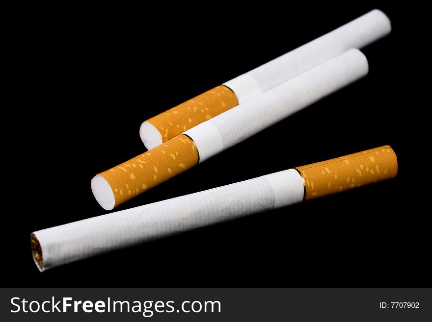 Cigarettes isolated on black background