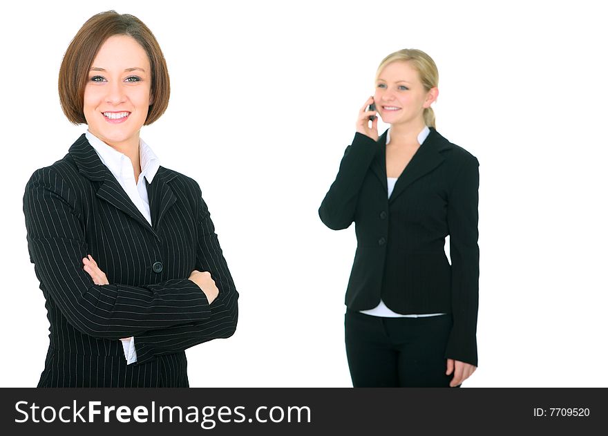 Isolated businesswoman smiling with her associate on the background. Isolated businesswoman smiling with her associate on the background
