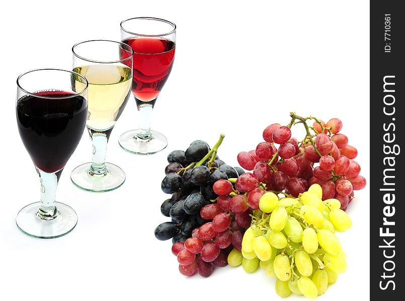 Shot of red white and rose wine with grapes. Shot of red white and rose wine with grapes