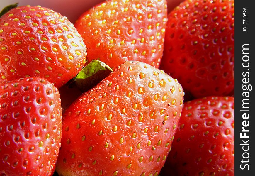 Close-up shot of red fresh strawberry. Close-up shot of red fresh strawberry.