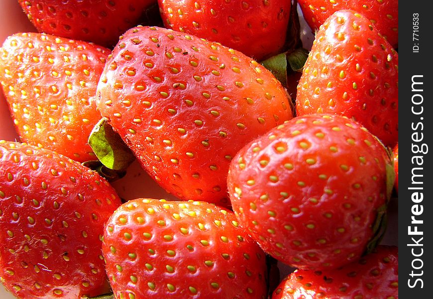 Close-up shot of red fresh strawberry. Close-up shot of red fresh strawberry.