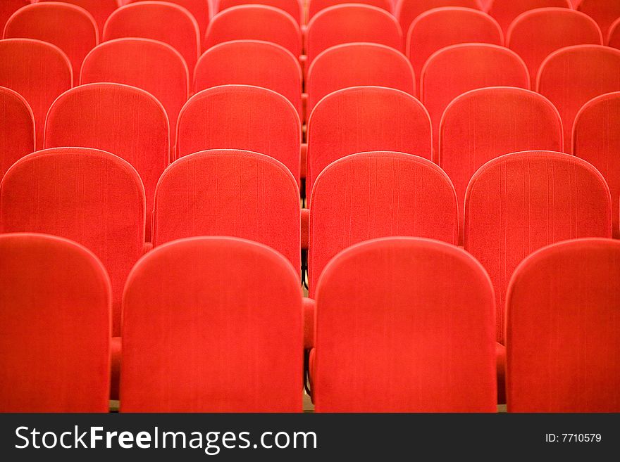 Red chairs in the cinema