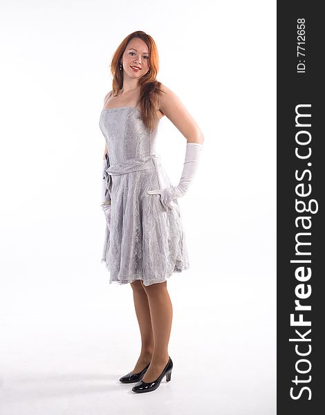 Young girl with white gloves standing on white background. Young girl with white gloves standing on white background